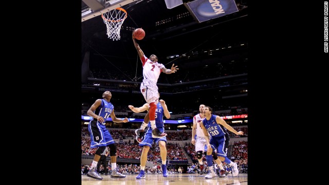 Russ Smith of Louisville drives for a shot attempt.