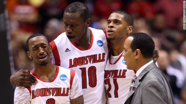 From left, Russ Smith, Gorgui Dieng, Chane Behanan and assistant coach Kevin Keatts of the Cardinals react after Ware's injury.