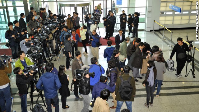 Reporters gather in front of customs at the Inter-Korean Transit Office in Paju in April.