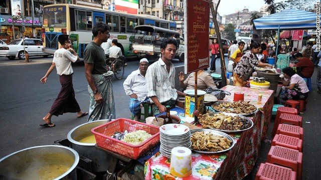 A typical Burmese meal includes steamed rice, fish, meat, vegetables and soup and all the dishes arrive at the same time. Locals use their fingertips to mold rice into a small ball and then mix it with various dishes.