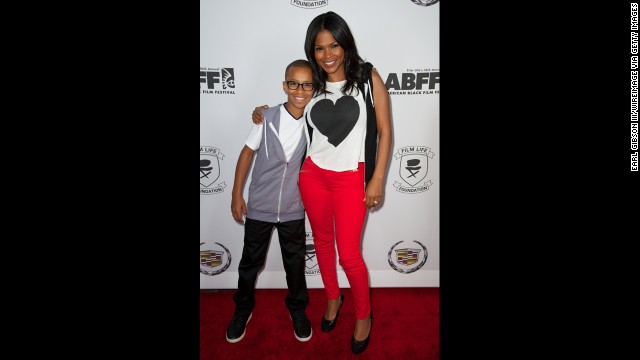 At 41, Nia Long welcomed her second child in November 2011. Long is shown here with her first child, Massai Dorsey II.