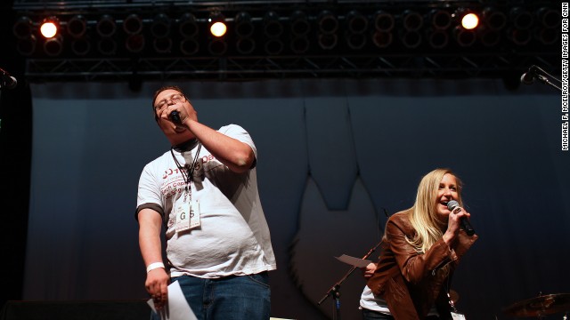 DJ Nate and Krista Kae introduce local band Post Coma Network, the opening act for the Second Dose of the CD102.5 Day concert series on April 6 at the Lifestyle Communities Pavilion in Columbus. The station supports local artists.