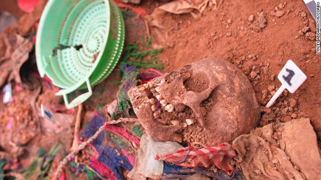 The trial offers a fascinating look in real time at how a nation, whose leaders are accused of genocide, is choosing to face its own demons. Following the 2002 exhumation of victims' remains in Xiquin Senai, ceremonies were held to properly bury the dead.