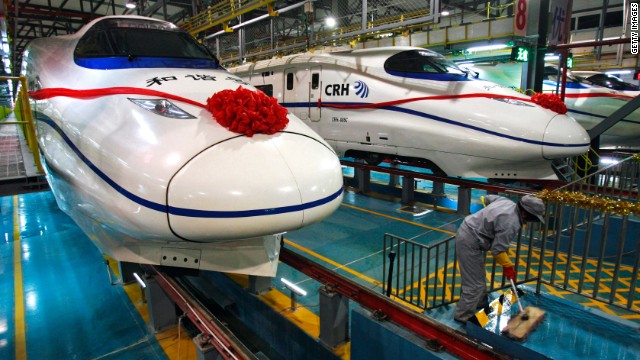 A worker preparing for the opening of the Wuhan Railway Station in 2009. High-speed rail service began in China in 2007 and now has the world's longest bullet train network, with routes nearing 10,000 kilometers in all.