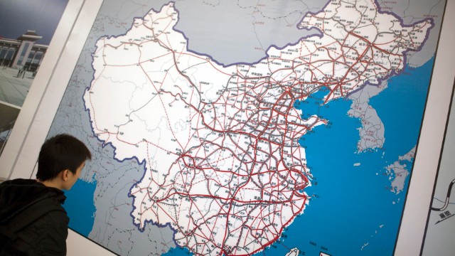Looking at a map of China's rail network in Guangzhou. Officials have said that by 2020, China's rail system -- high-speed and otherwise -- will have 120,000 kilometers of track.