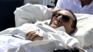 Mubarak wins appeal, but will stay detained