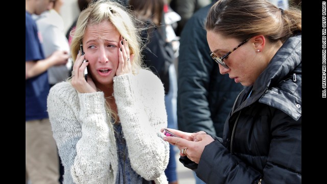 Women desperate to hear from loved ones are unable to get close to the site of the attack.