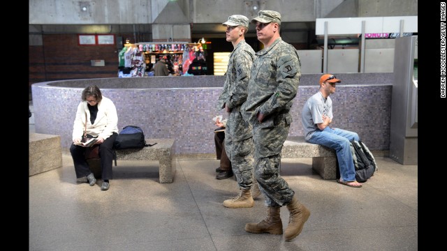 National Guardsmen patrol the Back Bay Station on April 16 as security remains tight in Boston.