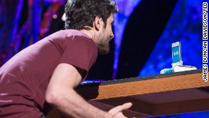 Keller Rinaudo demonstrates his robot, Romo, at TED2013 in Long Beach, California.