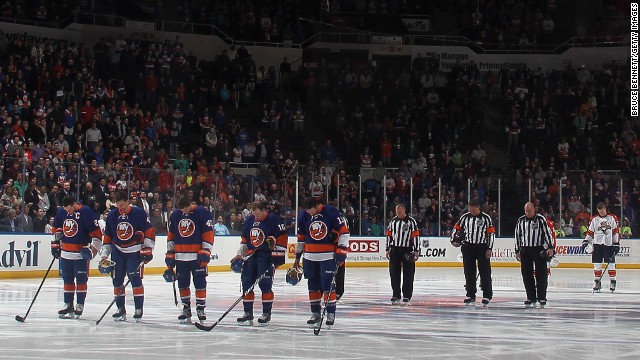 The New York Islanders and Florida Panthers stand for a moment of silence for the bombings at the Boston Marathon before their game at Nassau Veterans Memorial Coliseum on April 16 in Uniondale, New York.