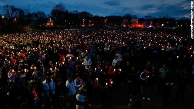 People gather Tuesday, April 16, at Garvey Park in Boston for a vigil for 8-year-old Martin Richard, killed by one of the bombs near the finish line of the Boston Marathon. Krystle Campbell, a 29-year-old restaurant manager from Medford, Massachusetts, and Lingzi Lu, a 23-year-old Chinese national attending graduate school at Boston University, also were killed in the bombings.