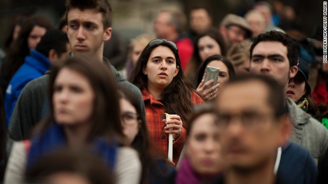 People gather in Boston Common on April 16 for a candlelight vigil for victims of the bombings in Boston.