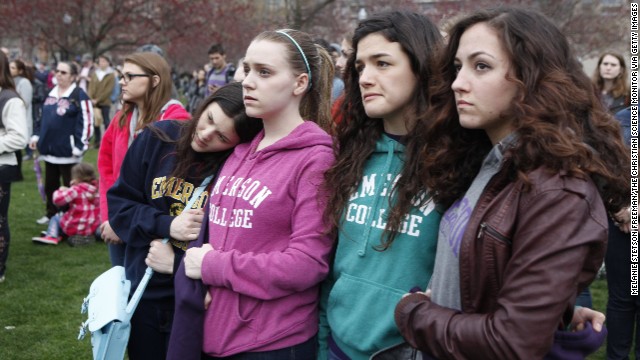 Emerson College students embrace one another at the vigil on Boston Common on April 16.