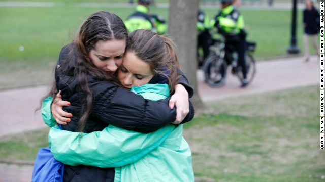 Emerson College students Rachel Ferullo, left, and Kathryn Waxman at a vigil on Boston Common for victims of the bombings.