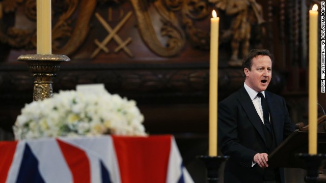 British Prime Minister David Cameron delivers a reading during the service.