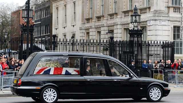 The hearse makes its way past Downing Street in London. 