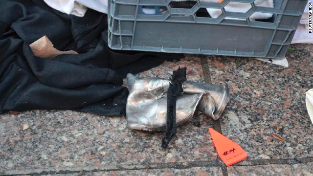 On Wednesday morning, a federal law enforcement source with firsthand knowledge of the investigation told CNN that a lid to a pressure cooker thought to have been used in the bombings had been found on a roof of a building near the scene.