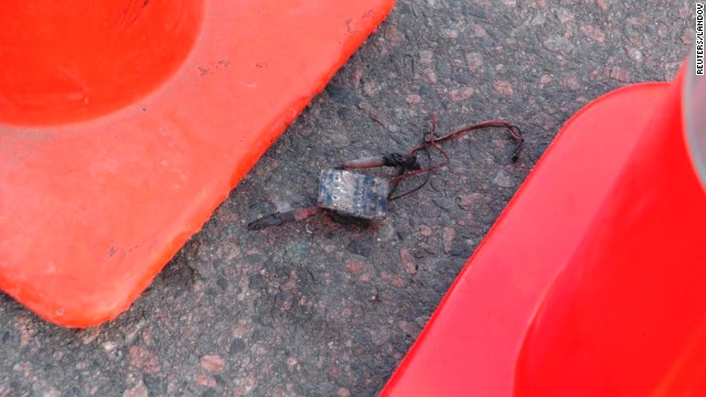 The pieces suggest each of the devices was 6 liters (about 1.6 gallons) in volume, a Boston law enforcement source said.