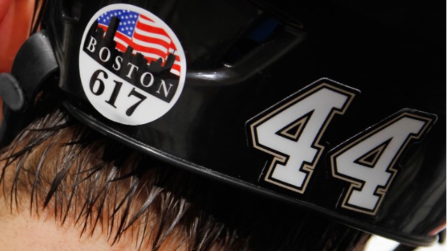 Brooks Orpik of the Pittsburgh Penguins shows his support for Boston with a sticker on his helmet during the Penguins' game against the Montreal Canadiens on April 17.