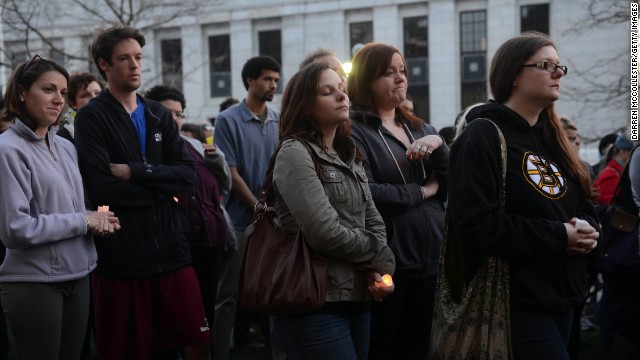 People pray during a vigil held by the city of Cambridge, Massachusetts, on April 17 to show support for those affected by the Boston Marathon bombings.