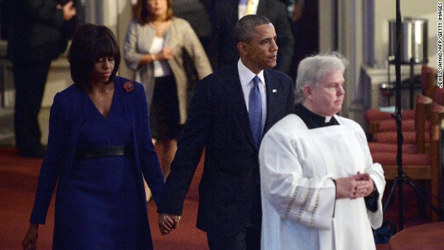 President Barack Obama and first lady Michelle Obama arrive at the interfaith service for the victims of the Boston Marathon bombing, at the Cathedral of the Holy Cross in Boston, on April 18.