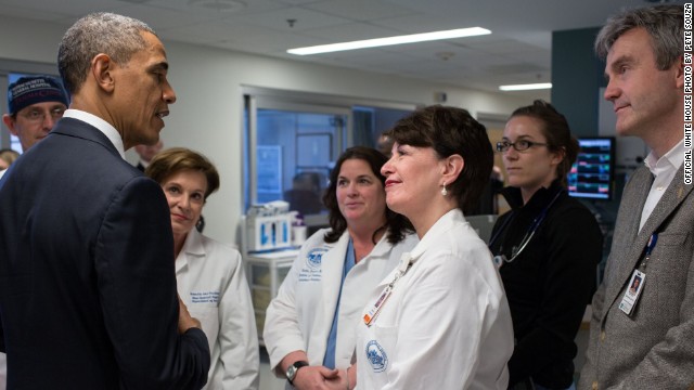 President Barack Obama talks with Massachusetts General Hospital staff on April 18 while visiting patients injured in the terror attack. 