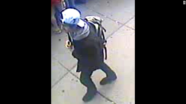 The FBI on Thursday, April 18, released photos and video of two men it called suspects in the deadly bombings at the Boston Marathon and pleaded for public help in identifying them. The two men were photographed walking together near the finish line of the marathon before the explosions that killed three people and wounded about 180.