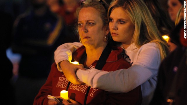 Two women embrace during a candlelight vigil in Somerville, Massachusetts, for the victims of the Boston Marathon bombing on Thursday, April 18. 