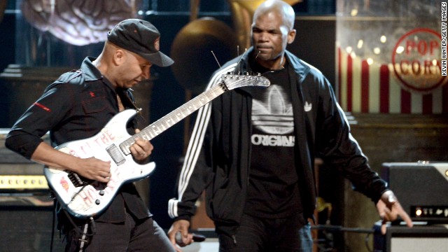 Rage Against the Machine guitarist Tom Morello, left, and Run-DMC's Darryl McDaniels perform onstage.