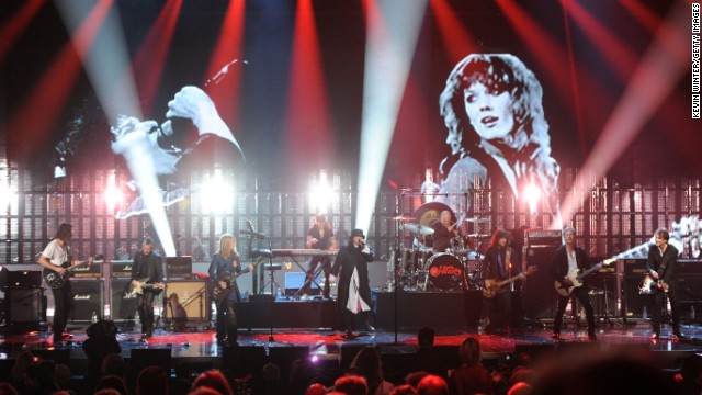 Chris Cornell and Mike McCready of Pearl Jam perform alongside Heart.