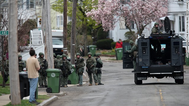 SWAT teams continue the ongoing manhunt in Watertown, Massachusetts.