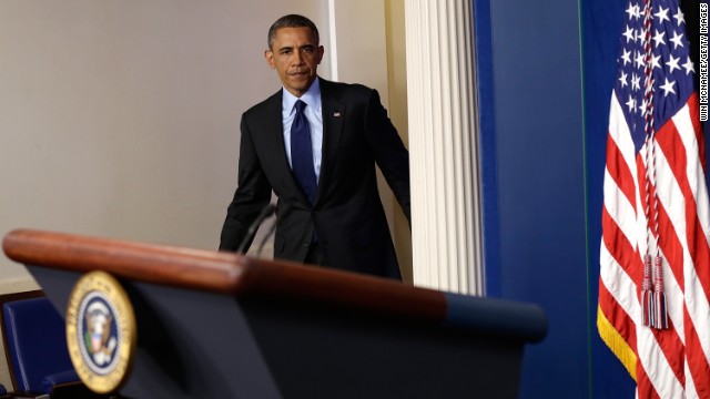 President Barack Obama arrives in the White House briefing room to make a statement late April 19 about the capture of Dzhokhar Tsarnaev. "We've closed an important chapter in this tragedy," he said.