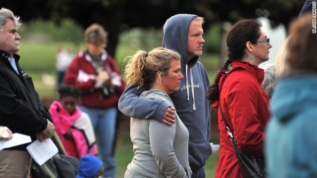 Huntsville, Alabama, residents hold a prayer vigil on Friday, April 19, for those lost and injured in the bombing at the Boston Marathon. Three people died when two bombs went off Monday, April 15, near the finish line. View photos from the attacks.