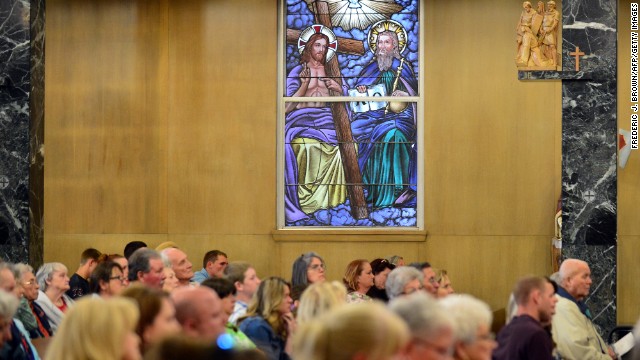 Residents tend a prayer service at St. Mary's.