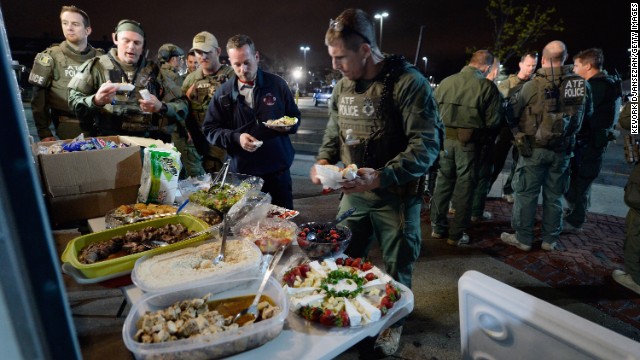 Officers from the Department of Alcohol, Tobacco, Firearms and Explosives relax Friday after the capture in Watertown, Massachusetts. 