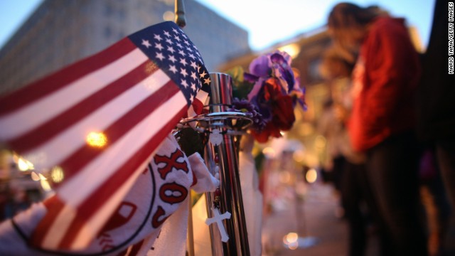 A flag decorates the memorial on Boylston Street in Boston on April 20.