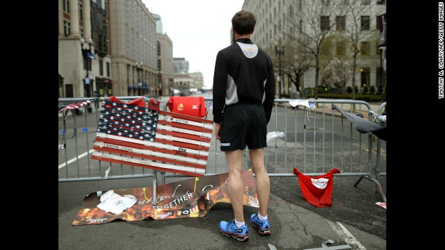 A man looks out onto Boylston Street on April 20.