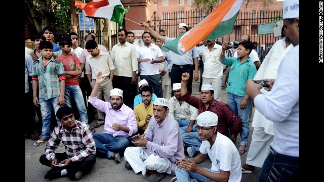 Indian protesters shout slogans against the government and New Delhi police outside a hospital in the city on Friday, April 19.