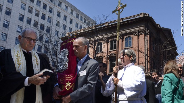 Leaders of an interfaith service participated in a vigil at the memorial for the victims of the Boston Marathon bombings, near the finish line on Boylston Street in Boston on April 21.