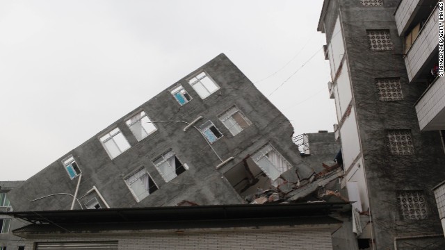 A building in Ya'an is lopsided on Sunday.