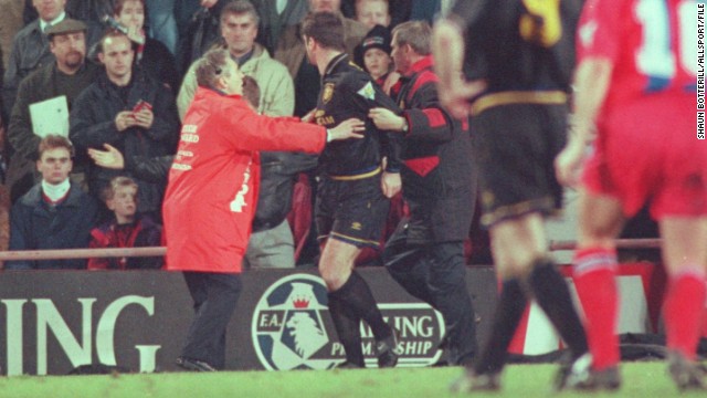 Manchester United's Eric Cantona suffered a moment of madness during an EPL match at Crystal Palace in January 1995. Cantona had been given a red card for kicking an opponent and, while making his exit from the pitch, the Frenchman jumped over the advertising boards and aimed a scissor kick at a fan who he claimed was shouting insults at him. Cantona was banned for nine months and also served 120 hours community service.
