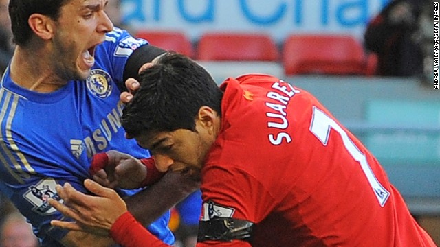  Liverpool's <a href='http://www1.skysports.com/watch/video/sports/football/8663783/suarez-biting-incident' target='_blank'>Luis Suarez has been banned for 10 games by the English Football Association for biting Chelsea's Branislav Ivanovic</a> during Sunday's match at Anfield. It was the latest example of a player displaying questionable behavior in front of a vast array of television cameras. As football coverage has grown over the last two decades, so has the scrutiny placed on the stars of the "beautiful game." In this gallery, CNN highlights times when players have seemingly forgotten the eyes of the world are watching...