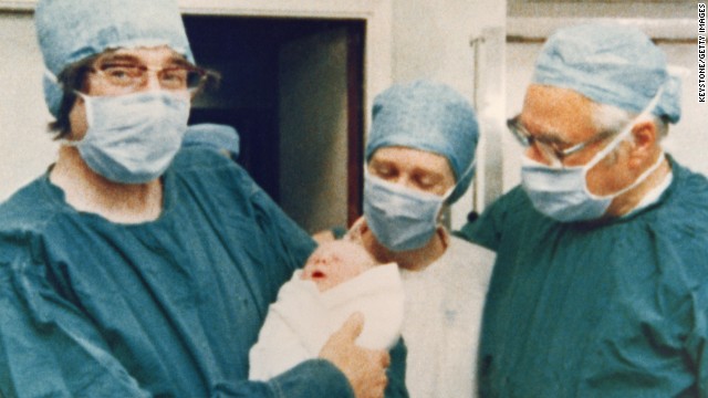 <a href='http://www.cnn.com/2013/04/10/health/obit-edwards-ivf/index.html'>Sir Robert Edwards</a>, a "co-pioneer" of the in vitro fertilization technique and Nobel Prize winner, died April 10 in his sleep after a long illness, the University of Cambridge said. He was 87. He is pictured on July 25, 1978, holding the world's first "test-tube baby," Louise Joy Brown, alongside the midwife and Dr. Patrick Steptoe, who helped develop the fertility treatment.