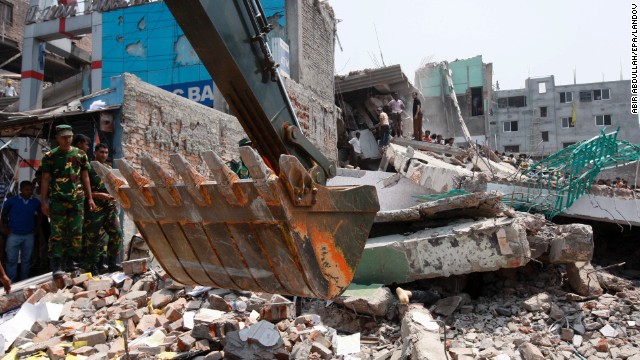 A body is trapped under the damaged building on April 24.