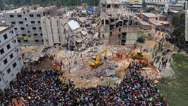 People rescue garment workers trapped at an eight-story building outside Dhaka, Bangladesh, on Thursday, April 25, after<a href='http://www.cnn.com/2013/04/25/world/asia/bangladesh-building-collapse/index.html'/> it collapsed the day before and killed nearly 200 people. Authorities fear many others remain trapped in the ruins of the building, which housed <a href='http://money.cnn.com/2013/04/24/news/companies/bangladesh-factory-collapse/index.html'>garment factories</a> and shops, the national news agency reported.” width=”640″ height=”360″ border=”0″></div>
<div> </div>
<div>4/25/2013 –  <a href=