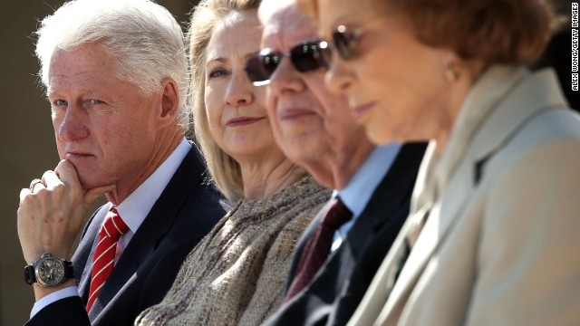 Left to right: Former President Bill Clinton, former first lady Hillary Clinton, former President Jimmy Carter and former first lady Rosalynn Carter listen during the opening ceremony.