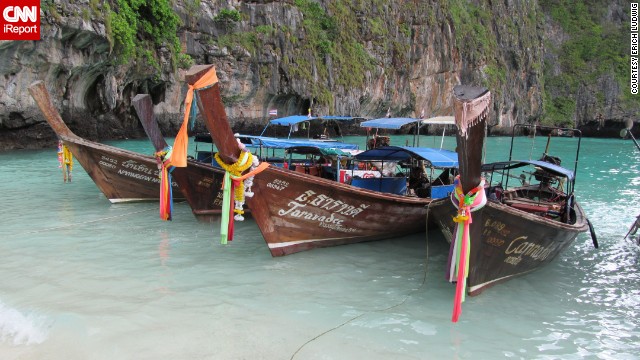 "As far as exotic yet relatively inexpensive vacations go, you will be surprised by this place," says Erich Ludwig. He and his wife took a day trip to the <a href='http://ireport.cnn.com/docs/DOC-911049'>Phi Phi Islands</a> on one of these boats while vacationing in Phuket, Thailand.