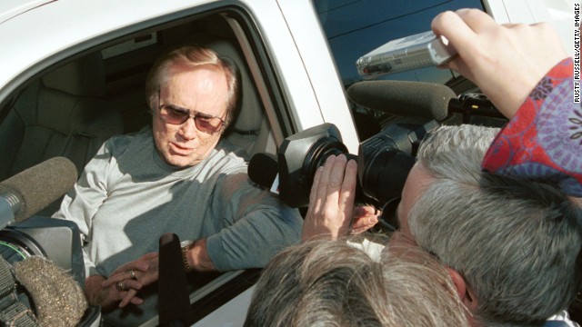 Jones talks with reporters in Nashville before greeting protesters who were rallying in front of WSM Radio studios against radio format changes in January 2002.