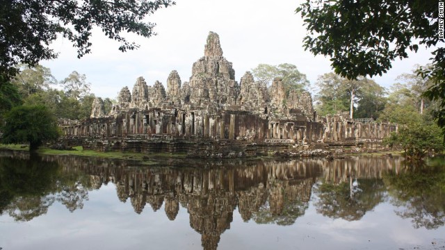 Scattered between the twisting roots of the Cambodian jungle, this site dedicated to the Hindu god Vishnu contains the remains of Khmer Empire capitals dating from the 9th to the 15th centuries. Among the most famous of its 100-strong group of monuments is the Temple of Angkor Wat and, at Angkor Thom, the sculptural Bayon Temple. In 2000, Cambodian authorities allowed action flick "Tomb Raider" to be filmed at the site on the proviso that no guns would be fired.