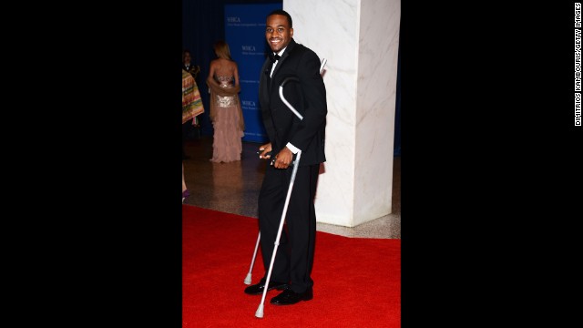 University of Louisville basketball star Kevin Ware, who broke his leg during a game against Duke, arrives on crutches.